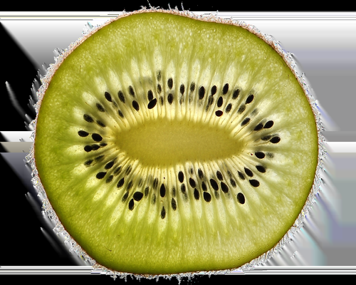 Fresh papaya cut in half showing seeds